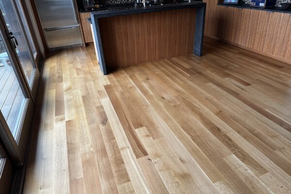 white oak hardwood refinishing in Mercer Island lakefront home by LUKS Construction